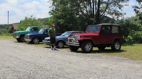 Man calling about four wheel drive vehicle Stock Footage 11476245