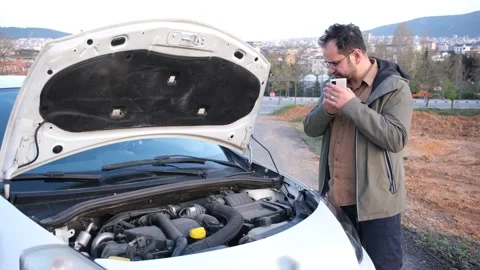 Man calling car mechanic Stock Footage 196164980