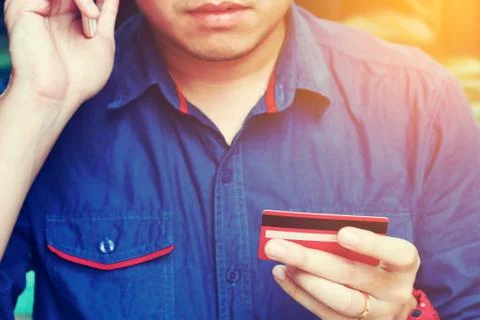 Man calling to customer service with checking about problem credit card. Stock Photos