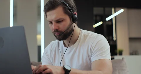 Man calling on laptop computer talk by webcam, learning study with online tutor Stock Footage 269138691