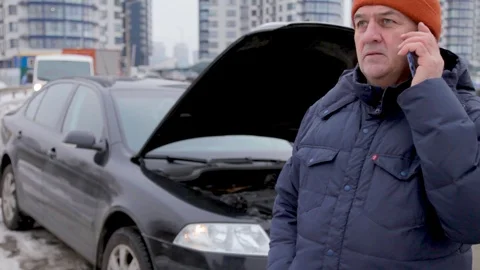 A Man Calling Roadside Assistance For Help With His Car Trouble 스톡 동영상 102624069