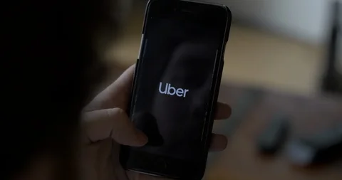 Man Calling an Uber on Phone Stock Footage 106577085