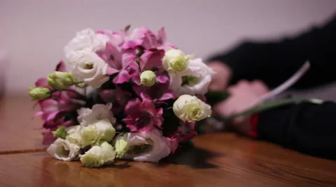 Man came onto a date or meeting with flowers bouquet Stock Footage 59189747