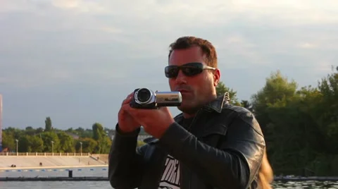 Man with a camera Stock Footage 8650136