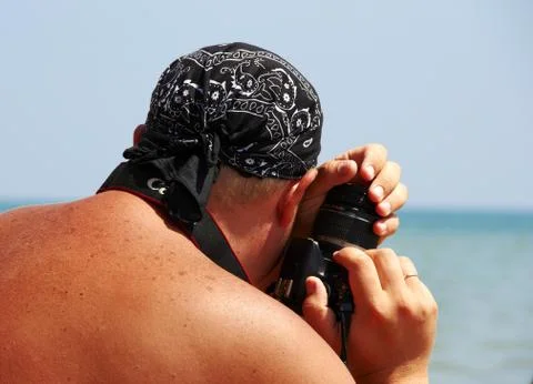 Man with camera Stock Photos