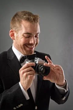 Man with camera Stock Photos