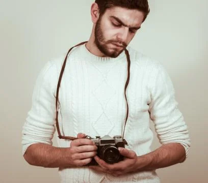 Man with camera Stock Photos