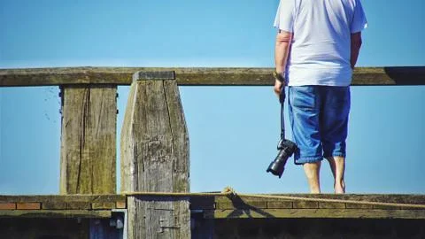 A man with a camera Stock-Fotos