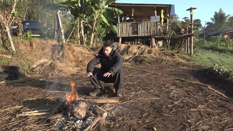 A man with the campfire at Mae Hong Son, Thailand Stock Footage 101188060