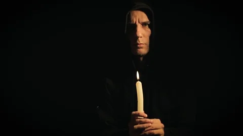 Man with a candle Video stock 86197411