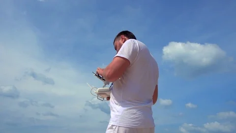 Man Cannot find Drone in the Sky Stock Footage 72450756