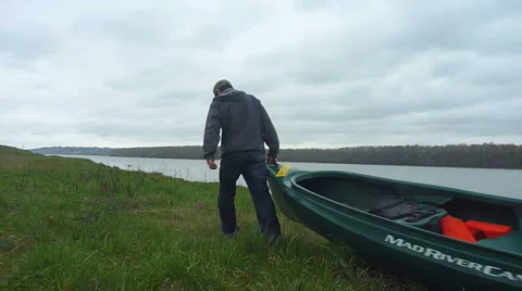 Man with Canoe 1 Stock Footage 2583089