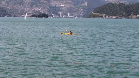 A man canoening on the water Video stock 77119825