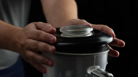 Man cap the blender Stock Footage 118019900