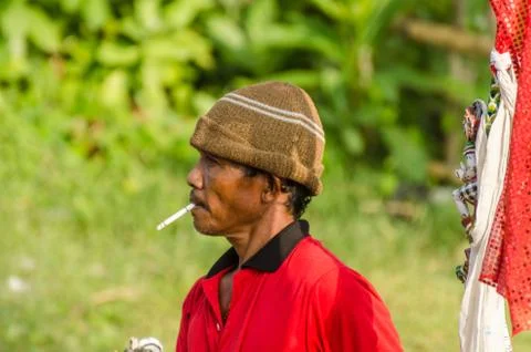 Man cap cigarette Stock Photos