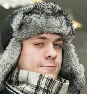Man in a cap with earflaps Foto stock