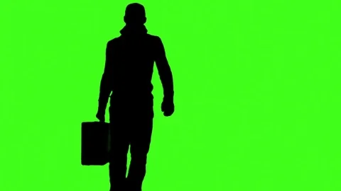Man with cap takes his suitcase and goes to the camera Stock Footage 72110054