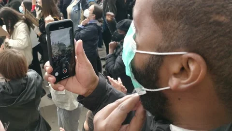Man capturing Black Lives Matter Protest Rally on his phone, London 4K Stock Footage 132059992