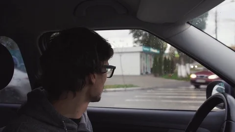 The man in the car Stock Footage 82425788