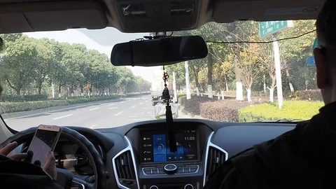 The man in the car talking on a mobile phone 29 Stock Footage 106588604