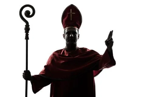 Man cardinal bishop silhouette saluting blessing Stock Photos