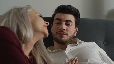 Man caressing a woman's head Stock Footage 99941518