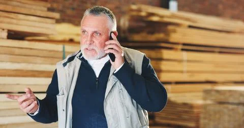 Man, carpenter and talk in workshop with phone call, discussion and ideas for Stock Photos