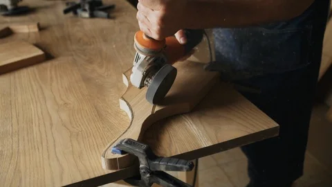 A man carpenter is working with wood using circular saw machine Stock Footage 89308337