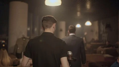 Man carries a hookah for guests Video stock 76563631