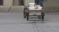 Man carrying his containers with fresh water HD Footage