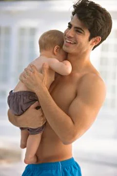 Man carrying his son Stock Photos