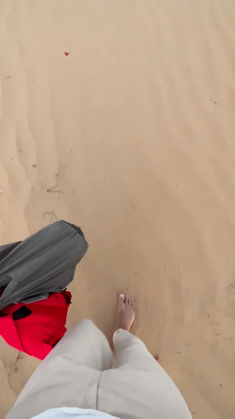 Man carrying packages in the desert. Stock Footage 254468204