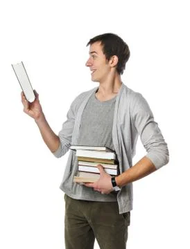 Man carrying a stack of books Stock Photos