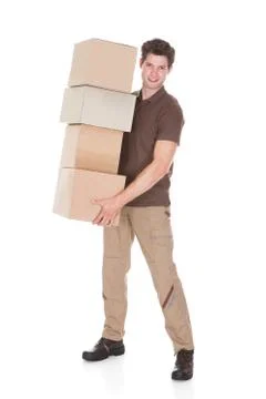 Man carrying stack of boxes Stock Photos
