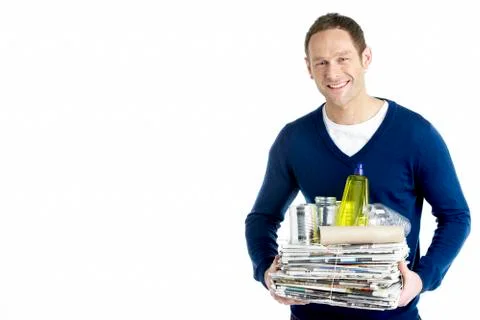 Man Carrying Stack Of Recycling 스톡 사진