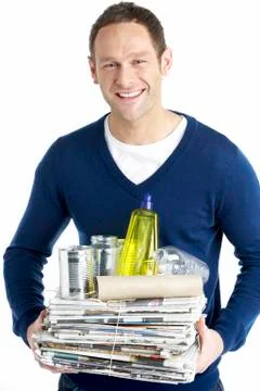 Man Carrying Stack Of Recycling 스톡 사진