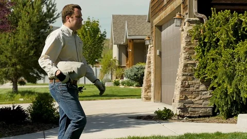 Man is carrying stone style case and walking Stock Footage 122026807