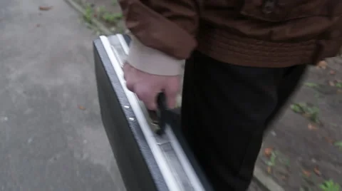 Man with a case Stock Footage 48318513