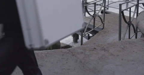 Man with case near river Video stock 86566003