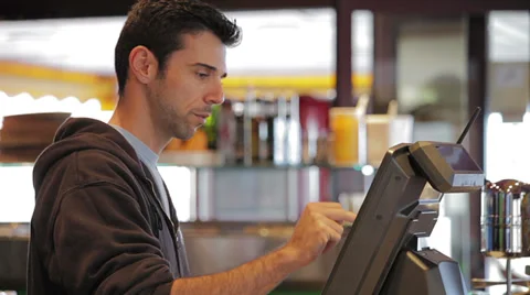 Man at cash register - close up Video stock 35407679