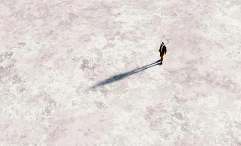 Man casting long shadow on empty ground Stock Illustration