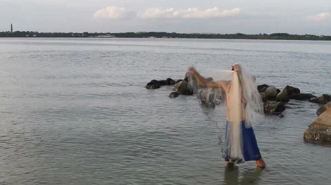 Man Casting Net Stock Footage 948484
