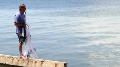 Man Casting Seine Net Видео 11017235