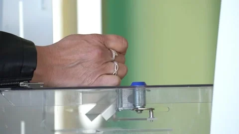 A man casts his ballot at a polling station during presidential elections Stock Footage 178957840