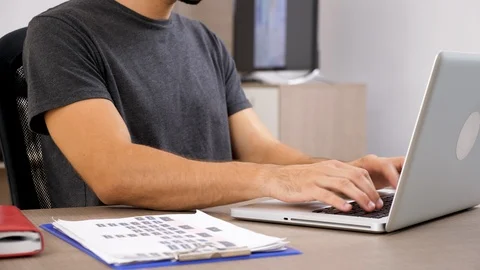 Man in casual clothes typing fast on laptop keybord Stock Footage 95288080