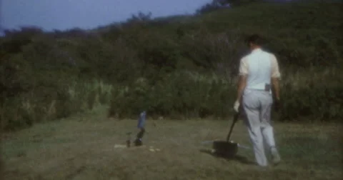 Man Catapult Checking Shooting Riffle 70s 60s 16mm Stock Footage 46837408