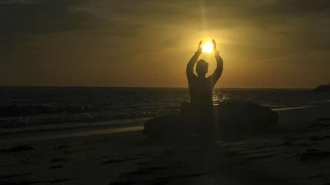 A Man catch the sun in the beach Stock Photos