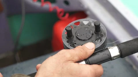 Man catches a predatory fish Stock-Footage 97840965