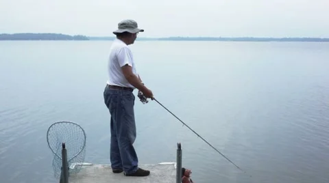 Man catching a fish. Stock-Footage 8679570