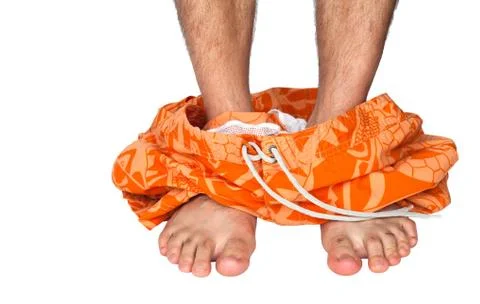 Man caught with bathing suit down Stock Photos